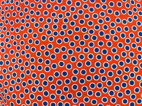 2 Metres Of A Retro-Esque Spotted Print 100% Polyester Marocain Dress Fabric (Orange)
