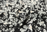 3 Metre Piece Of A Pretty All Over Floral Print Spun Viscose Dress Fabric (Black/Ivory/Peach)