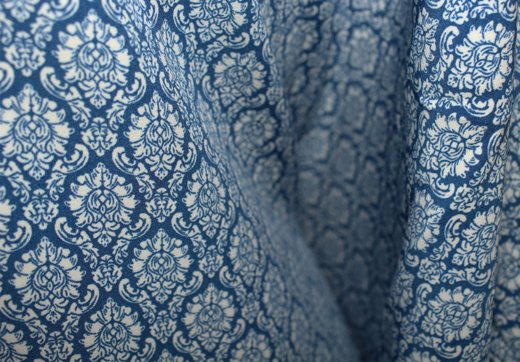 2 Metres "Stately Shield" Print Soft Poly Spandex Dress Fabric (Smokey Blue)