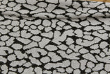 2 Metres Of "Irregular Pebbles" Print Polyester Viscose Knit Jersey Dress fabric